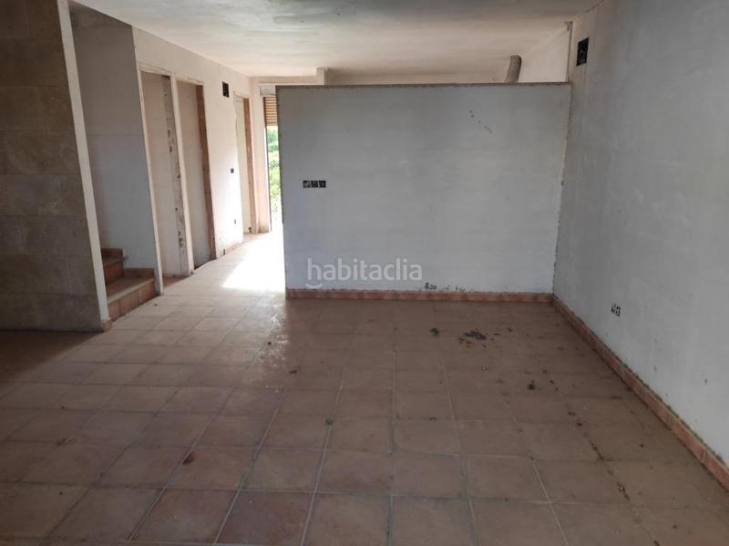Foto 59d14a11-f5a0-49e8-bbd9-0ab952639474. Edificio  en construccion detenida de 10 viv. adosadas en Parcent