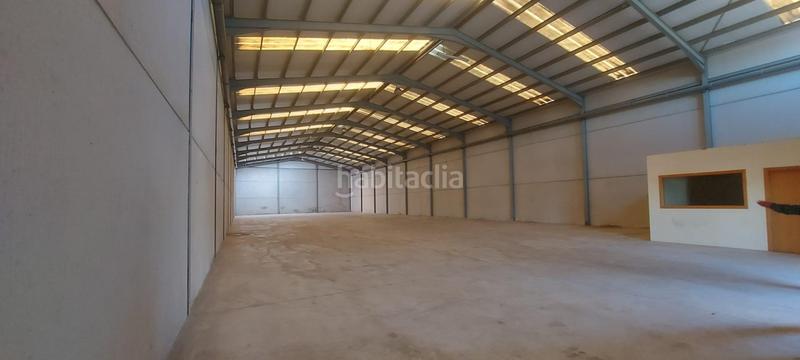 Foto 628bb082-4f00-4ad1-a649-646540a2c3b1. Bâtiment à usage industriel dans Altura