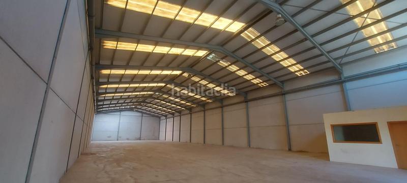 Foto ed919a4a-ceff-4f4a-9edc-9a3b6058fdf0. Bâtiment à usage industriel dans Altura