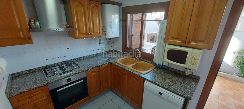 Foto 07e5471b-7e86-4cc9-9a46-58857e4c7270. Casa aparellada amb calefacció aparcament piscina a Sagunt