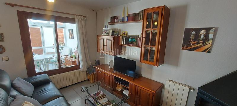 Foto 10afcb3b-1625-4044-af1e-df3cb0f1ac57. Casa aparellada amb calefacció aparcament piscina a Sagunt