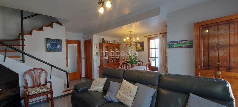 Foto 2c0e3447-6346-4bf7-9373-51ee306633c9. Casa aparellada amb calefacció aparcament piscina a Sagunt