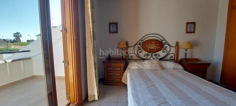 Foto 4f8844c6-1007-4bfe-a237-cbf3d23a614f. Casa aparellada amb calefacció aparcament piscina a Sagunt