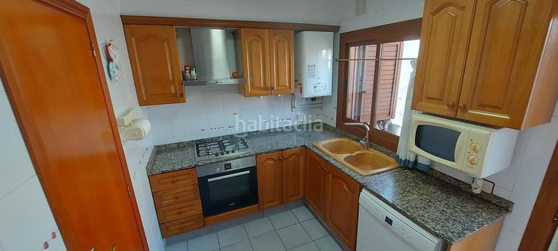 Foto bbad6b49-d0ca-470f-93c7-87a87d569d7d. Casa aparellada amb calefacció aparcament piscina a Sagunt