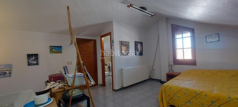 Foto bf73c040-2fec-4159-9b15-7590e252c3c8. Casa aparellada amb calefacció aparcament piscina a Sagunt