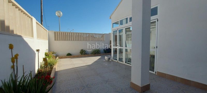 Foto 0a2fb615-2640-42ac-88db-490912a6c737. Casa aparellada amb aparcament a Corinto-Almardà Sagunt