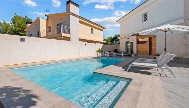 Foto d37272f7-c0e0-49af-a8c7-f4ec39230da2. Casa a schiera con riscaldamento parcheggio piscina in Alfàs del Pi (l´)
