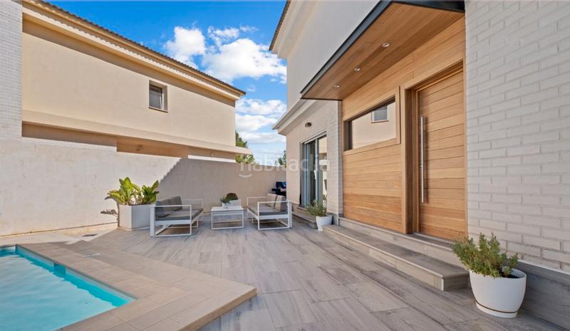 Foto ebefe056-436d-4481-8864-a2bb4f63e582. Casa a schiera con riscaldamento parcheggio piscina in Alfàs del Pi (l´)