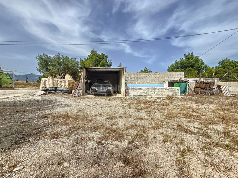 Foto 3f908576-99cb-4d91-8f56-10228a7bdfd6. Casa adossada amb aparcament a La Nucia Pueblo Nucia (la)