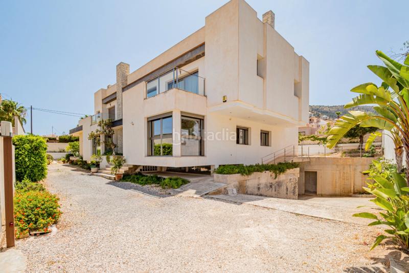 Foto d6e6eaf7-70c0-444e-bbd2-37a3edded343. Chalet con riscaldamento parcheggio piscina in L´Albir Alfàs del Pi (l´)