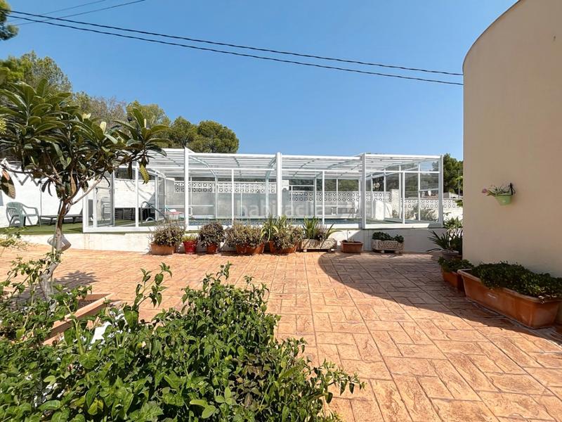 Foto 19b17dcd-ef02-42f2-bd85-c248ad929fa8. Casa a schiera con riscaldamento parcheggio piscina in Alfàs del Pi (l´)
