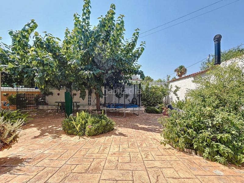 Foto bd05b440-c3ef-46cc-bb34-8bb95f6b87f2. Casa adossada amb calefacció aparcament piscina a Alfàs del Pi (l´)