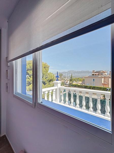 Foto f775de62-c1e7-4101-bd35-aecf7dab154e. Casa a schiera con parcheggio piscina in L´Albir Alfàs del Pi (l´)
