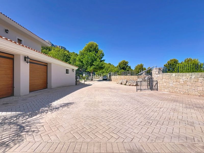 Foto 27390fea-f612-4544-b5aa-0d77940c828e. Chalet mit parking pool in Benimantell
