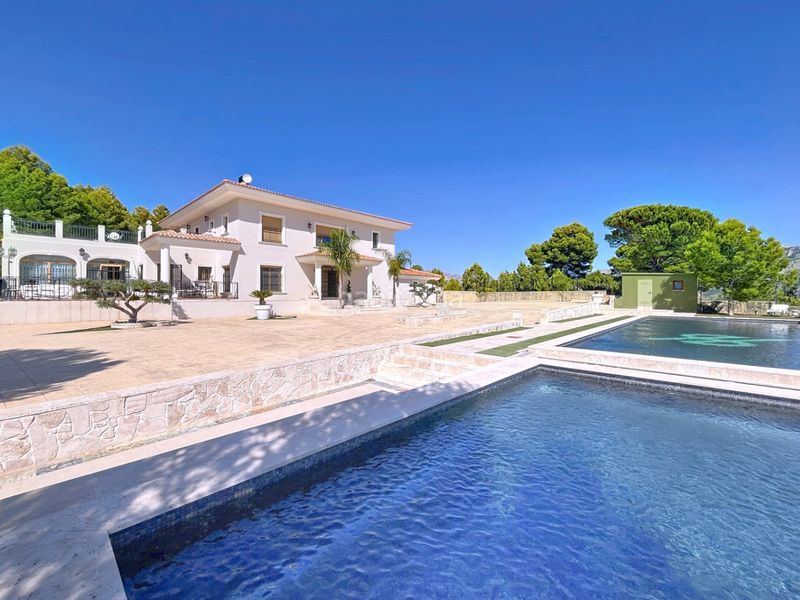 Foto b6dffc23-b657-45e4-a08f-e6d8077378a4. Chalet mit parking pool in Benimantell