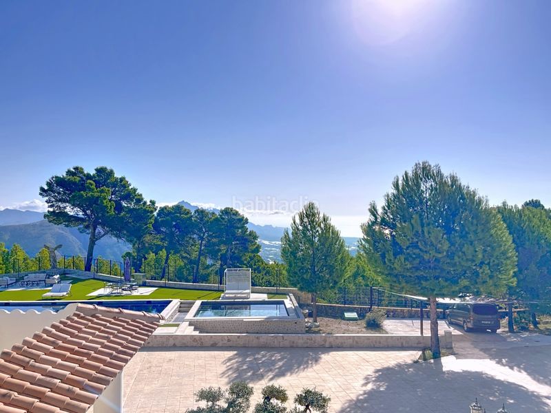 Foto b793136b-7f92-452a-96f6-08560be0e9b1. Chalet mit parking pool in Benimantell