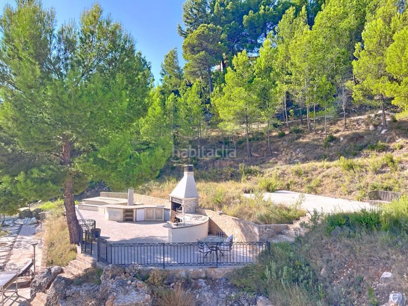 Foto f96a498a-114a-4bcd-af14-bcec3d436514. Chalet mit parking pool in Benimantell