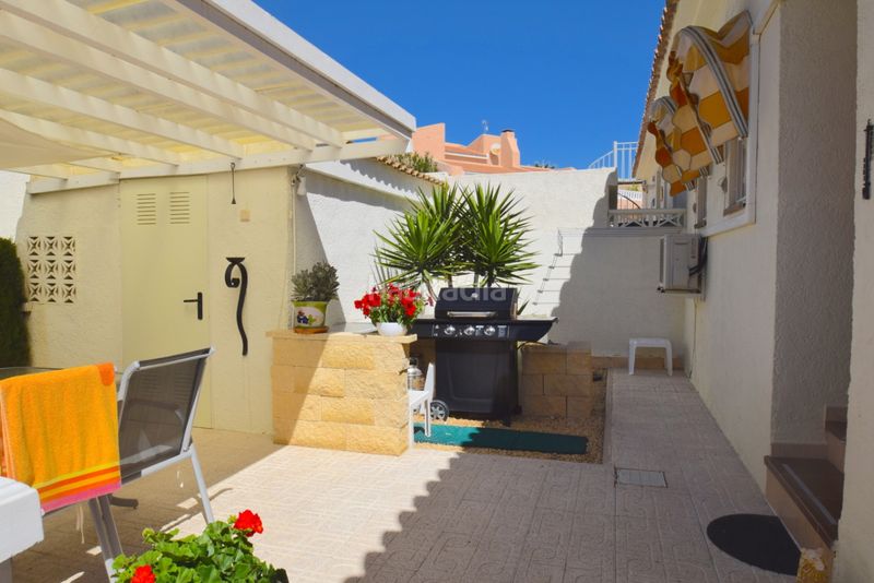 Foto f4977187-cfa1-4e05-98f1-d1e37eb7851c. Casa adossada amb aparcament piscina a La Nucia Pueblo Nucia (la)