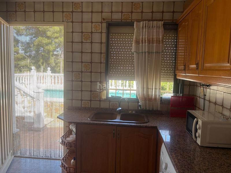 Foto fe2cc59e-a756-4771-8d34-8a07ca999573. Casa amb piscina a Godelleta