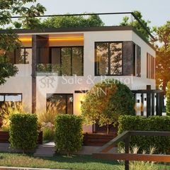 Casa a Fenals. Moderna y amplia casa adosada de obra nueva con jardín y piscina