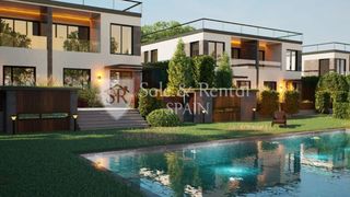 Casa a Fenals. Moderna y amplia casa adosada de obra nueva con jardín y piscina