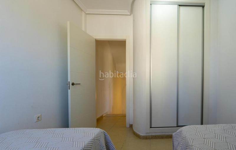 Foto 3c55871d-48d1-4a21-9883-845a050aea9e. Maison avec parking piscine dans La Marina Elche / Elx