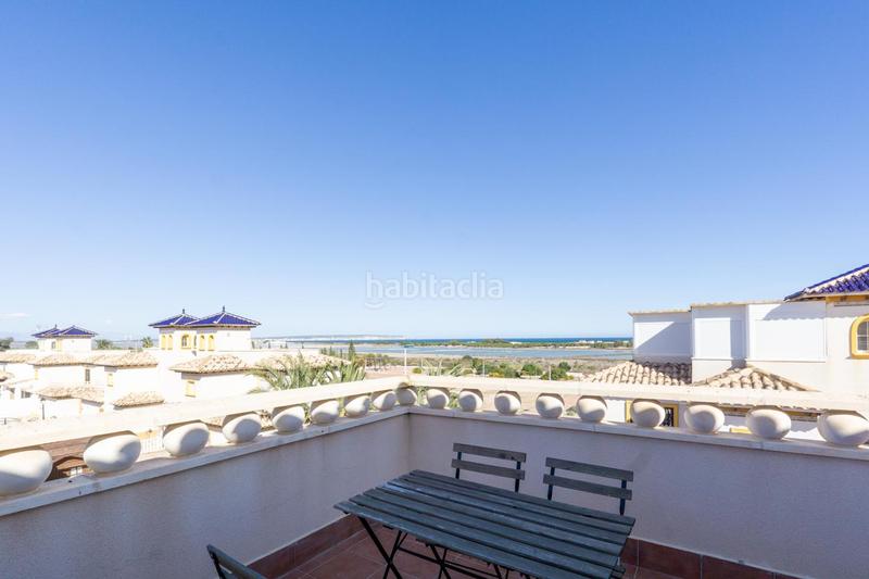 Foto 55bba6e5-fc4f-44c1-9df1-95295ff64a50. Maison avec parking piscine dans La Marina Elche / Elx