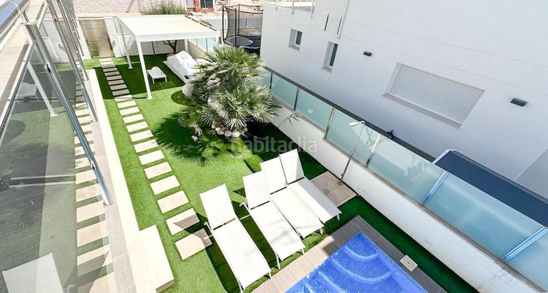 Foto fa8ff9a6-f7f3-45e9-9654-df9a25fbb981. Casa amb aparcament piscina a Monte y Mar Santa Pola