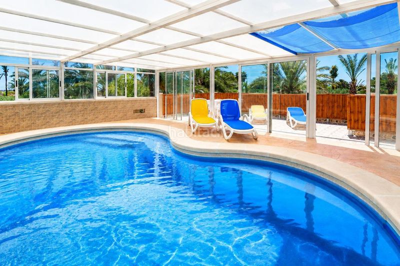 Foto 3ace1722-3c2d-4653-b6ec-7b0e2852826c. Casa amb aparcament piscina a La Marina Elche / Elx