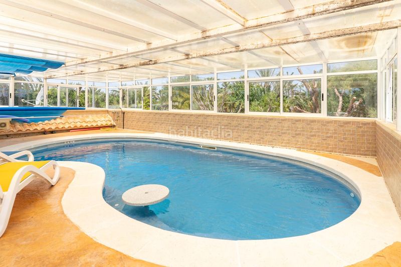 Foto 3e6ef799-325f-445e-b24d-55b4b0b101ed. Casa amb aparcament piscina a La Marina Elche / Elx