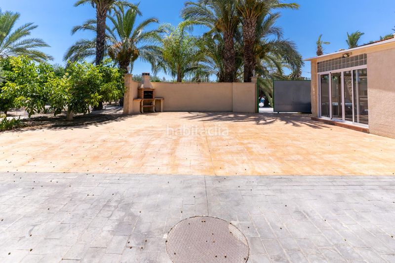 Foto c4c15010-6c0a-4f9b-89fe-8907728e2158. Casa amb aparcament piscina a La Marina Elche / Elx
