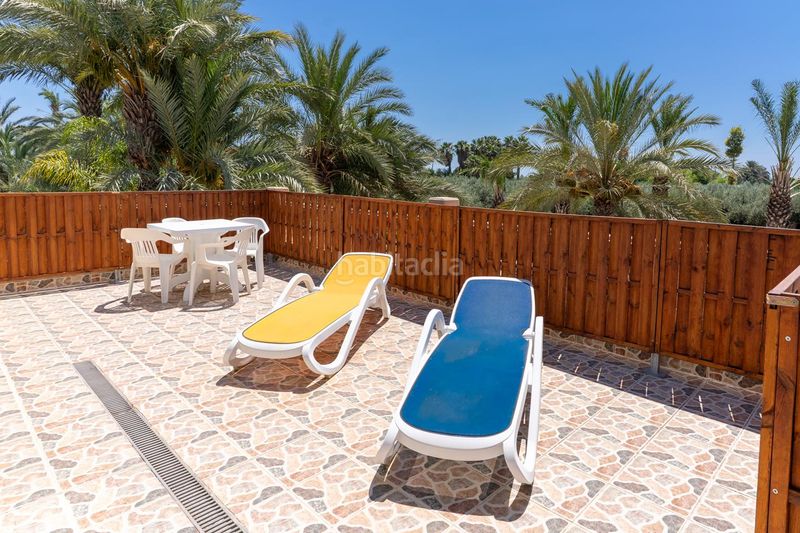 Foto df3d439c-f309-4226-b82d-1f4f71a25c50. Casa amb aparcament piscina a La Marina Elche / Elx