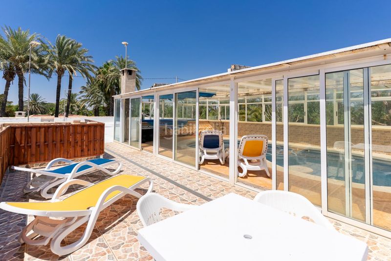 Foto eafc9c5a-9e3b-4180-9c76-4912620fdd3a. Casa amb aparcament piscina a La Marina Elche / Elx
