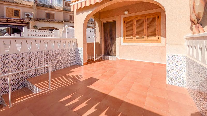 Foto b766a635-24f4-48a7-9594-b62a9042f45d. Casa adossada amb piscina a Los Arenales del Sol Elche / Elx