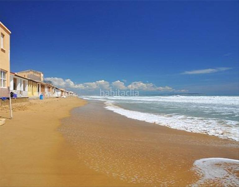 Foto dd11c77b-c41b-4d58-a5e2-731ccfec215c. Terreny residencial a Pueblo Guardamar del Segura