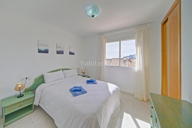 Foto 695e31a4-b873-471e-b405-011bd6c746ad. Casa adossada amb aparcament piscina a Cometa Calp