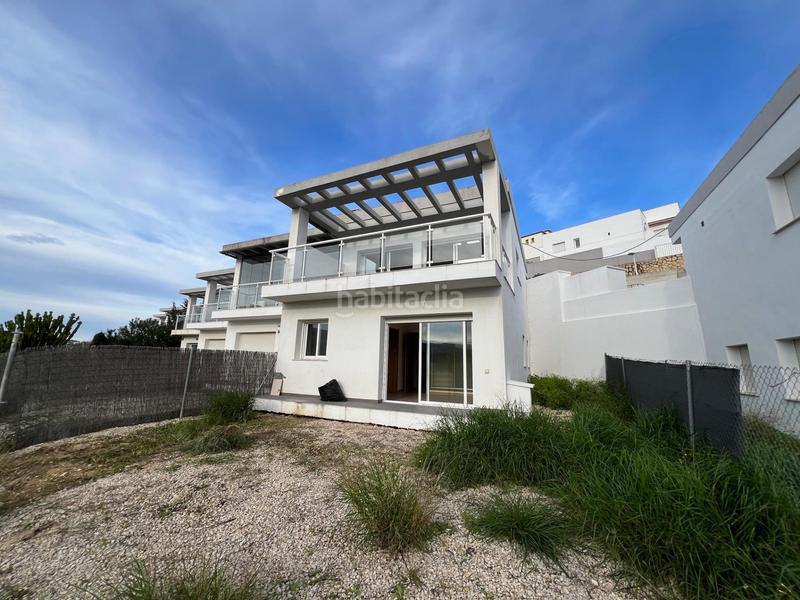 Foto a36c0e33-ff37-451c-9668-f28904505190. Casa a schiera con parcheggio piscina in La Empedrola Calp