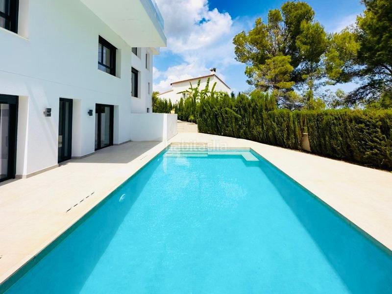 Foto 80ca9656-540f-457e-849d-d1e414bb7b6d. Chalet avec chauffage parking piscine dans Oltamar - Cucarres Calp