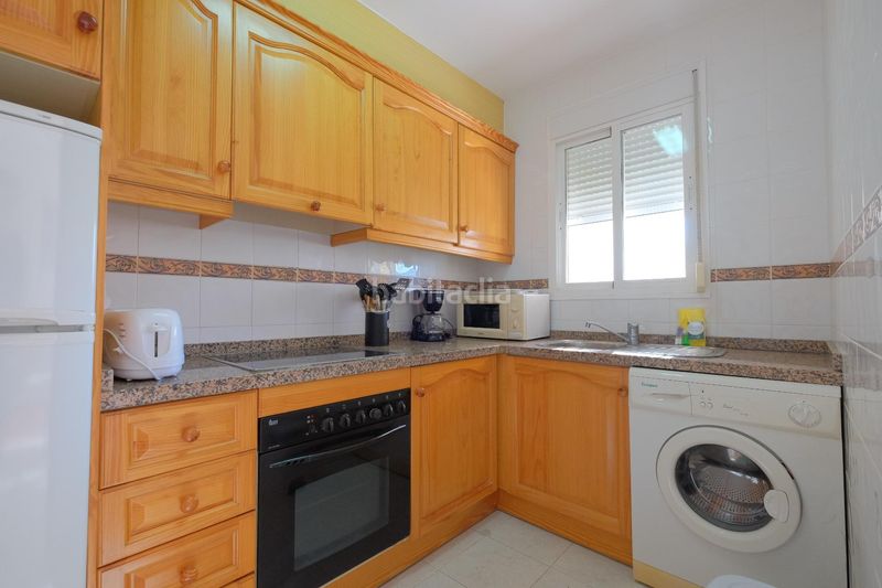 Foto 93a23f5d-170b-4a14-b786-ddb0ee75dd0c. Casa adossada amb aparcament piscina a Cometa Calp