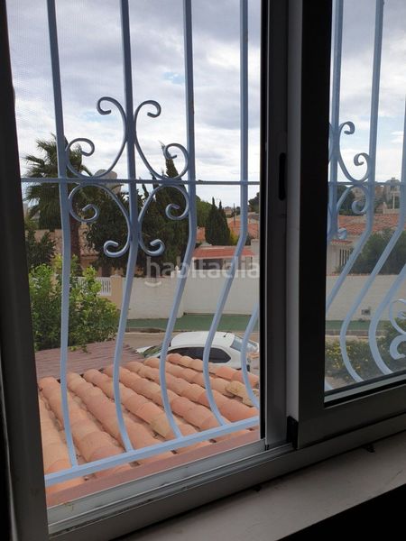 Foto 48fa96ca-71db-43aa-a9cf-290602670c2e. Casa amb calefacció aparcament a Benicolada - Las Adelfas Calp