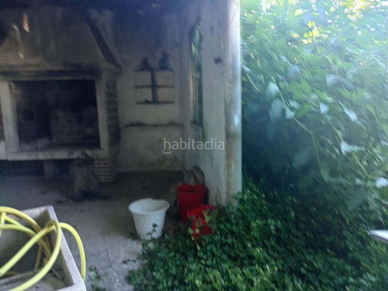 Foto f57b7f6b-71df-4bf2-8400-f75b6ef35dc0. Casa aparellada amb aparcament a Cee