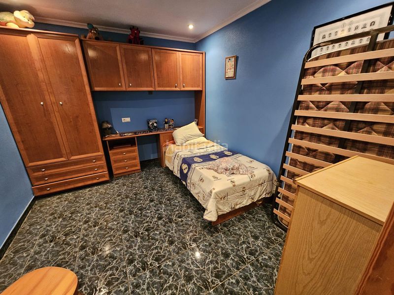 Foto 8f89e70a-9bf8-4783-8898-bfa499305b99. Casa aparellada amb calefacció a Monòver