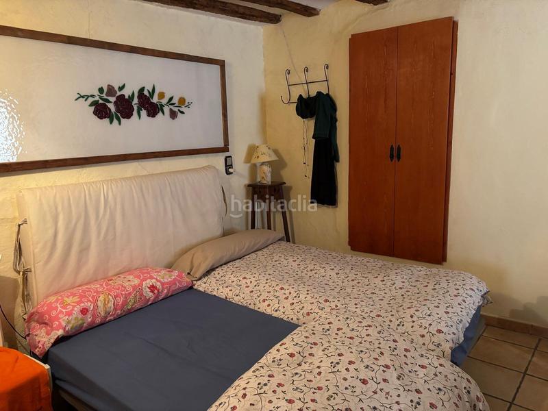 Foto 5c589443-54e2-4d69-88ee-ac5dfb6a073f. Casa aparellada amb calefacció a Benilloba