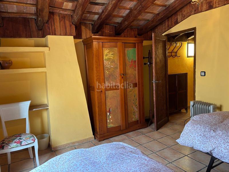 Foto b2079330-a94e-496a-8f01-a24e9367e8de. Casa aparellada amb calefacció a Benilloba