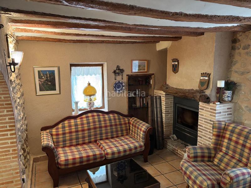Foto f195f617-cc25-4815-bd41-82430a10f32a. Casa aparellada amb calefacció a Benilloba
