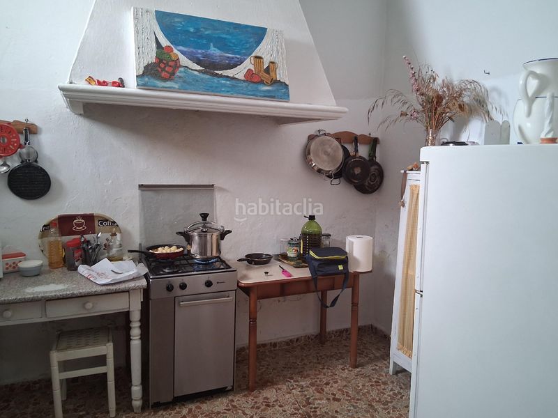 Foto 222a66b6-d4c9-4eea-88d3-41dc0ff141d5. Casa aparellada amb aparcament a Baeza