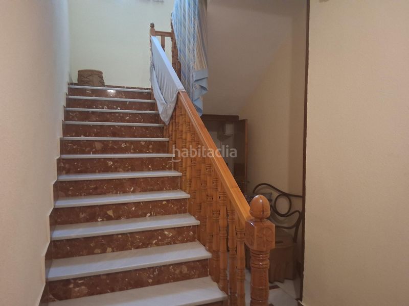 Foto c8572248-bbdc-4c59-b47f-fe4834dba563. Casa aparellada amb aparcament a Baeza