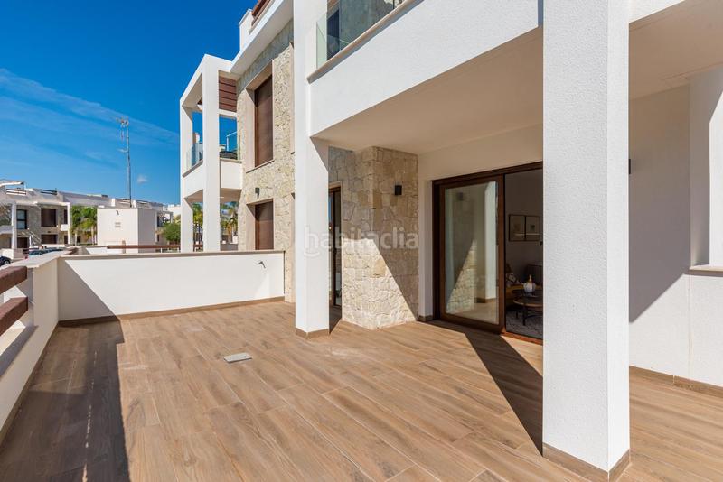 Foto dac92fd7-ec3f-48d0-8004-c718a6e5729a. Ground floor with pool in Los Balcones-Los Altos Torrevieja