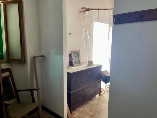 Foto 0a8809fa-3d85-4a5f-9e1f-ef4704ac8091. Casa aparellada a Campos poble Campos