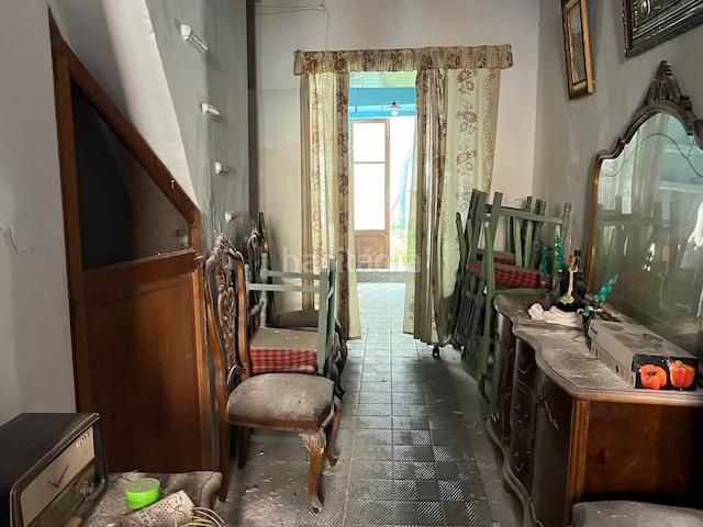 Foto 7c777ea7-6243-43e5-a34d-05180baa89e1. Casa aparellada a Campos poble Campos